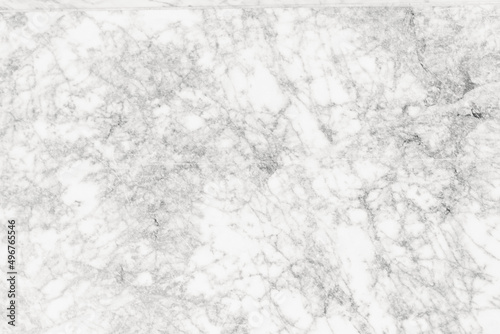 The texture of natural white marble made of natural tiles is a luxurious background for design works