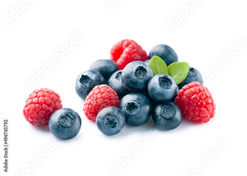 Sweet raspberry and blueberry on white backgrounds