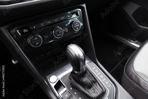 Gear lever and climate control panel of modern luxury crossover car © evannovostro
