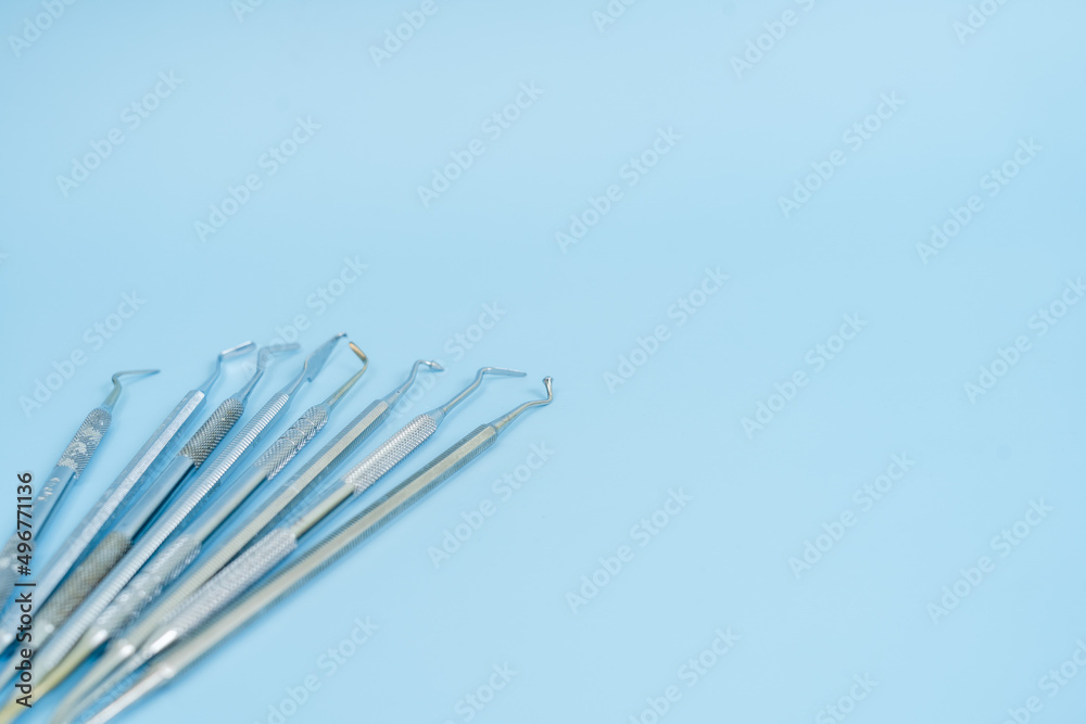 Dentist tool set. Teethcare, dental health concept. Blue background top view copy space Dentist tool set. Teethcare, dental health concept. Blue background top view copy space