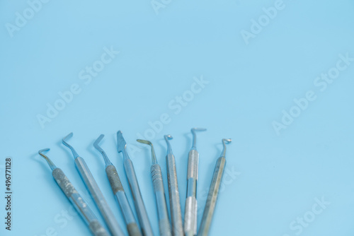 Dentist tool set. Teethcare  dental health concept. Blue background top view copy space