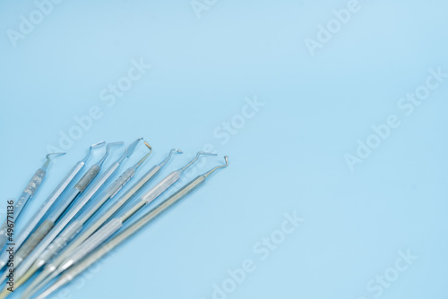 Dentist tool set. Teethcare  dental health concept. Blue background top view copy space