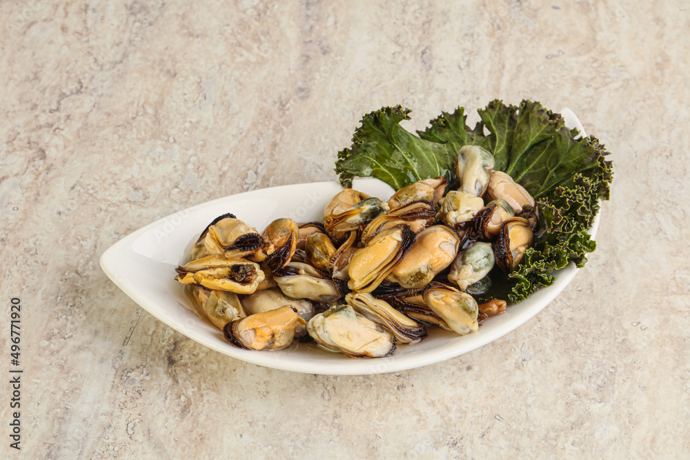 Tasty marinated mussels in the bowl Tasty marinated mussels in the bowl