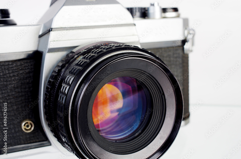 SLR camera on a white background. Close-up.