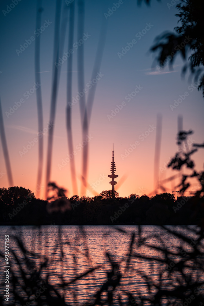 Hamburg television tower after sunset near the Alster