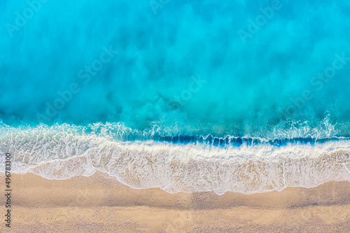 Top view aerial drone photo of Myrtos beach with beautiful turquoise water and sea waves. Vacation travel background. Ionian sea  Kefalonia Island  Greece