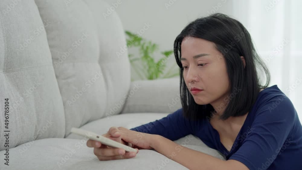 Depression and mental illness. Beautiful Asian woman disappointed and sad after receiving bad news. Stressed girl confused with unhappy problems in life, arguing with her boyfriend. Depression and mental illness. Beautiful Asian woman disappointed and sad after receiving bad news. Stressed girl confused with unhappy problems in life, arguing with her boyfriend.