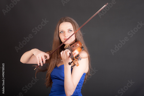 violinist on black background