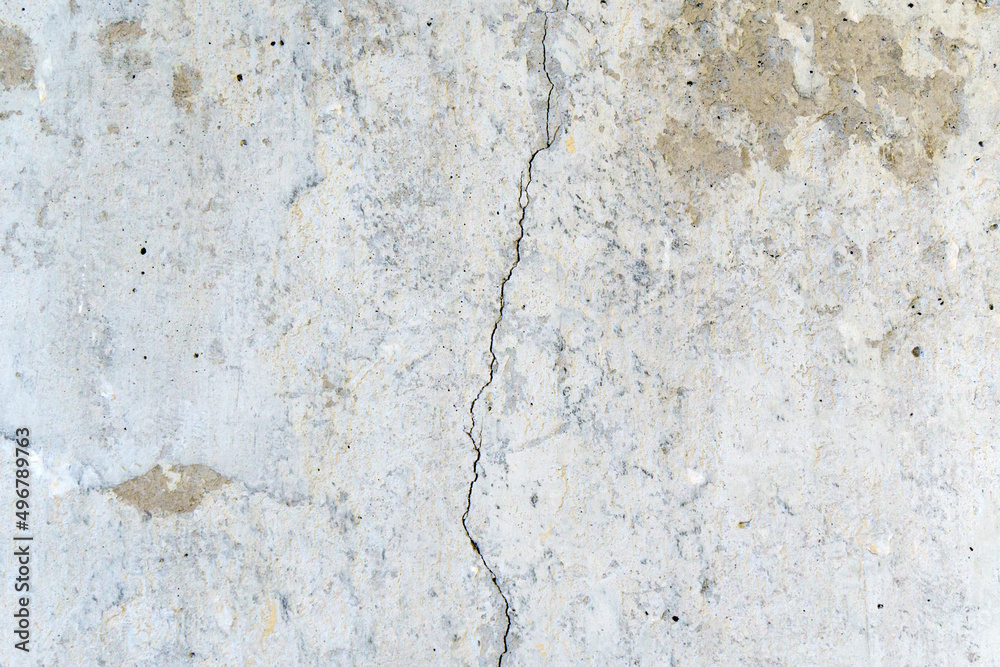 Crack on concrete wall texture, background, selective focus Crack on concrete wall texture, background, selective focus