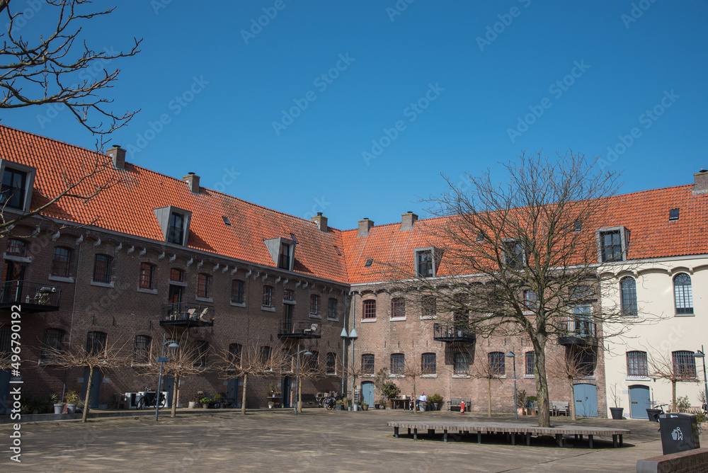 Fototapeta premium Hoorn, Netherlands, March 2022. The courtyard of the former prison on the Oostereiland in Hoorn.