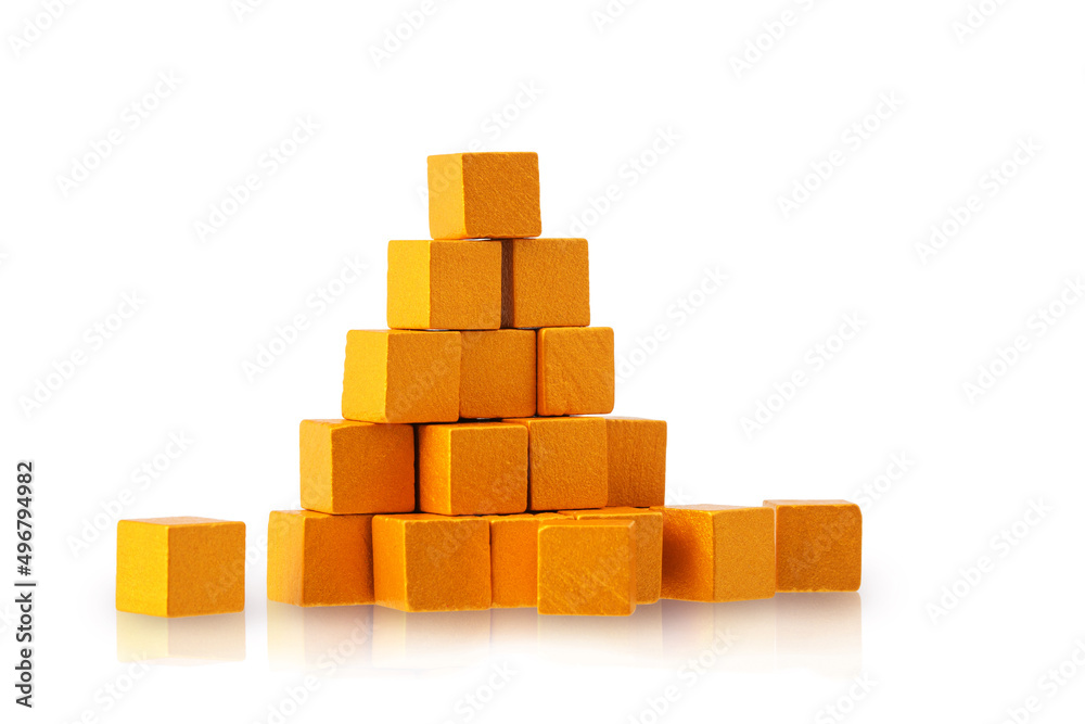 wooden cubes painted with gold paint isolated on a white background wooden cubes painted with gold paint isolated on a white background