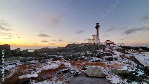 View of Cape Forchu Lighthouse. Cape Forchu, Nova Scotia, Canada. photo