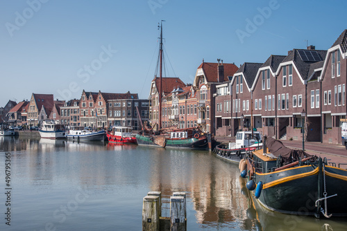 Hoorn  Netherlands  March 2022. The harbor of Hoorn with the old boats and historic facades.