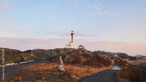 View of Cape Forchu Lighthouse. Cape Forchu, Nova Scotia, Canada. photo