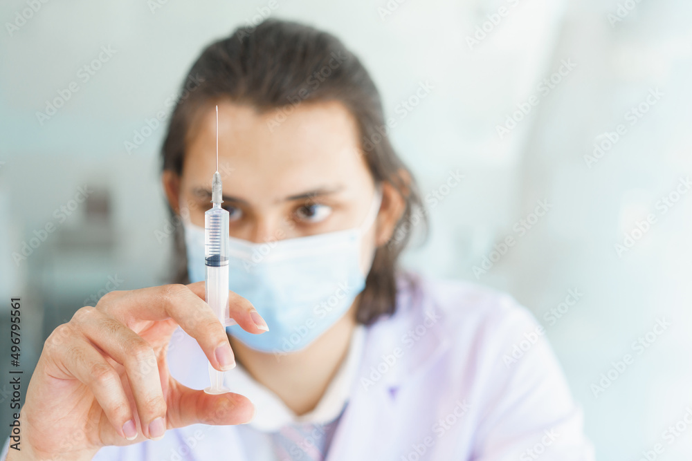 Vaccination concept, Doctor in face mask checking