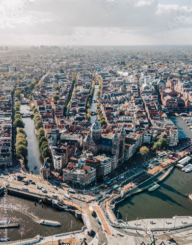 Photography Vertical aerial cityscape of Amsterdam, Holand with rivers and canals under the