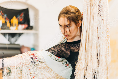 Close up of a portrait of focused flamenco woman dancer