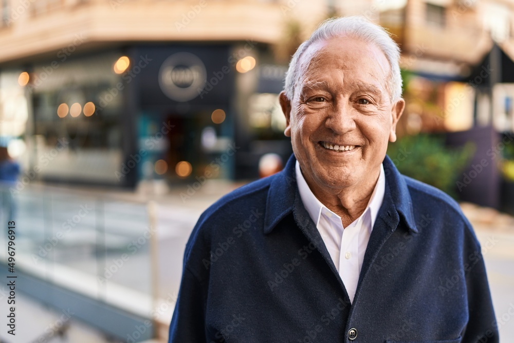 Senior man smiling confident standing at street Senior man smiling confident standing at street