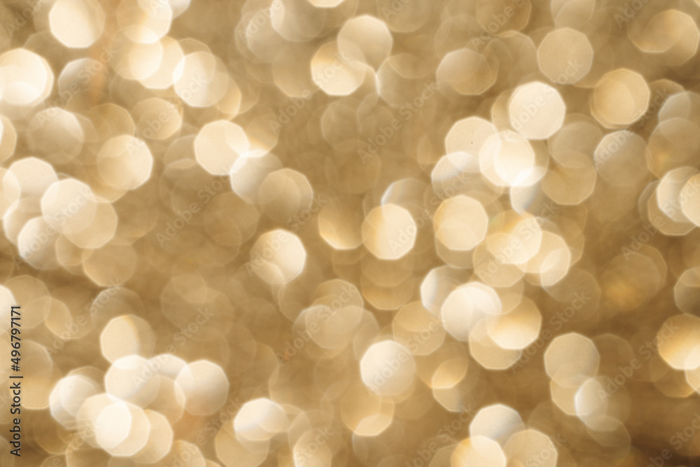 Golden sparkle background bokeh for christmas and new year holiday beauty products presentation. Beautiful luxury quality marketing overlay