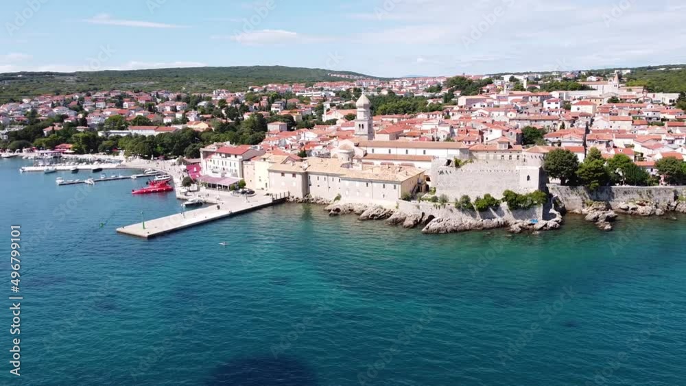 Krk Village at Krk Island, Croatia - Aerial Drone View of the Cityscape with Church, Cathedral, City Walls, Port, Boulevard and the Adriatic Sea Krk Village at Krk Island, Croatia - Aerial Drone View of the Cityscape with Church, Cathedral, City Walls, Port, Boulevard and the Adriatic Sea