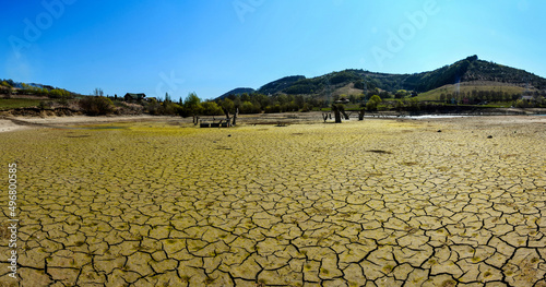 landscape with cracked soil due to drought