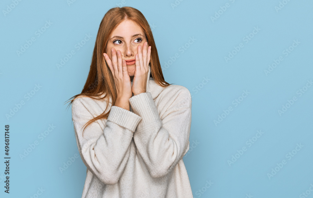 Young irish woman wearing casual winter sweater tired hands covering face, depression and sadness, upset and irritated for problem Young irish woman wearing casual winter sweater tired hands covering face, depression and sadness, upset and irritated for problem