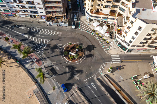 Aerial view of vehicles driving a roundabout in Arrecife downtown, Lanzarote, Canary Islands, Spain. photo