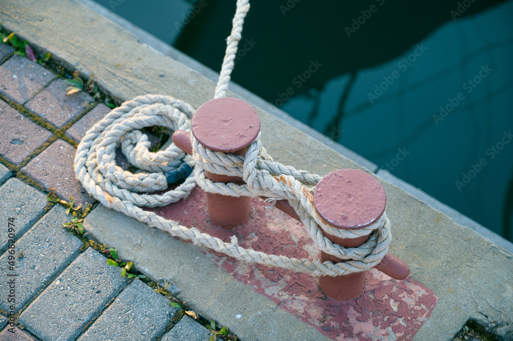 Fototapeta premium Old and rusty ships mooring bollard.
