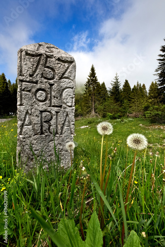 Ancient memorial stone from 1752 which delimits the territory of Folgaria. Coe Pass, Folgaria, Trento province, Trentino Alto-Adige, Italy, Europe. photo