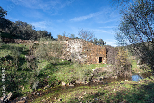 Old abandoned mill in extremadura meadow