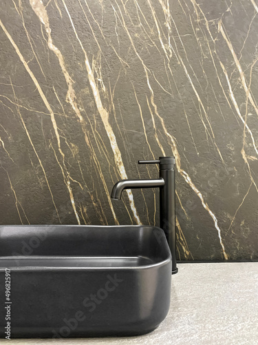 Black sink in the bathroom, close-up