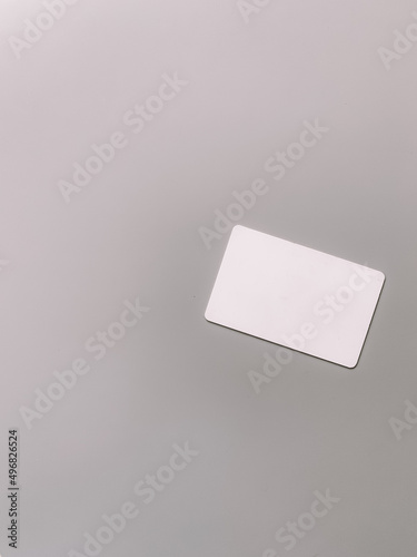 An empty white card on a gray background