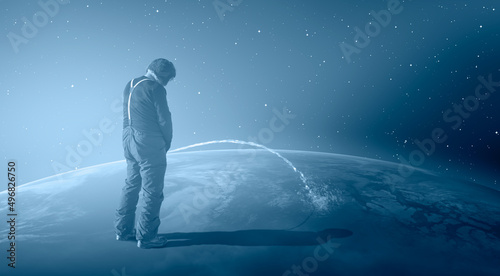 Global Warming Concept - A man is standing on the Planet Earth surface peeing towards the outher space "Elements of this Image Furnished by NASA"