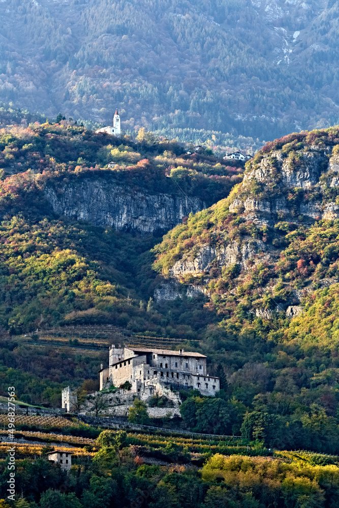 Noarna Castle and the church of Castellano. Villa Lagarina, Trentino, Italy.