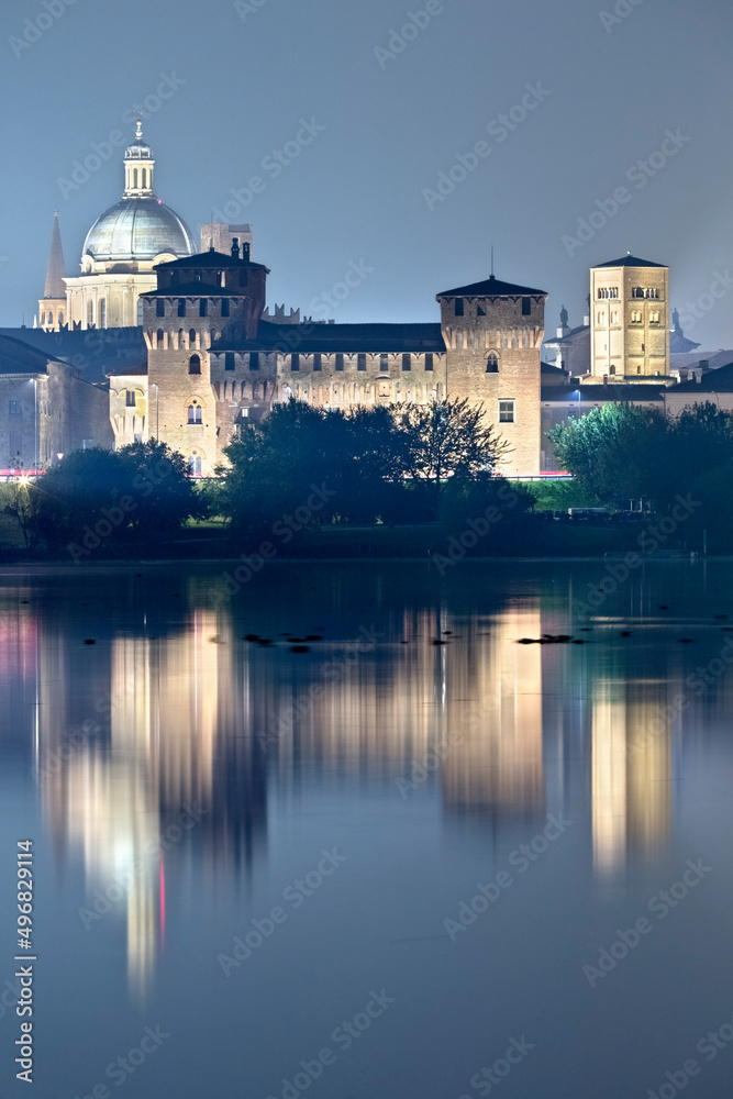 Mantova: the San Giorgio castle is reflected on the middle lake of the Mincio river. The city has been included in the list of UNESCO World Heritage Sites. Lombardy, Italy, Europe.