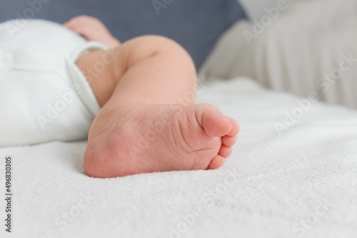 baby's foot. close-up. infant in the first months of life. motherhood,family photo