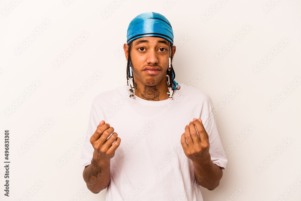 Young African American man isolated on white background showing that she has no money. Young African American man isolated on white background showing that she has no money.