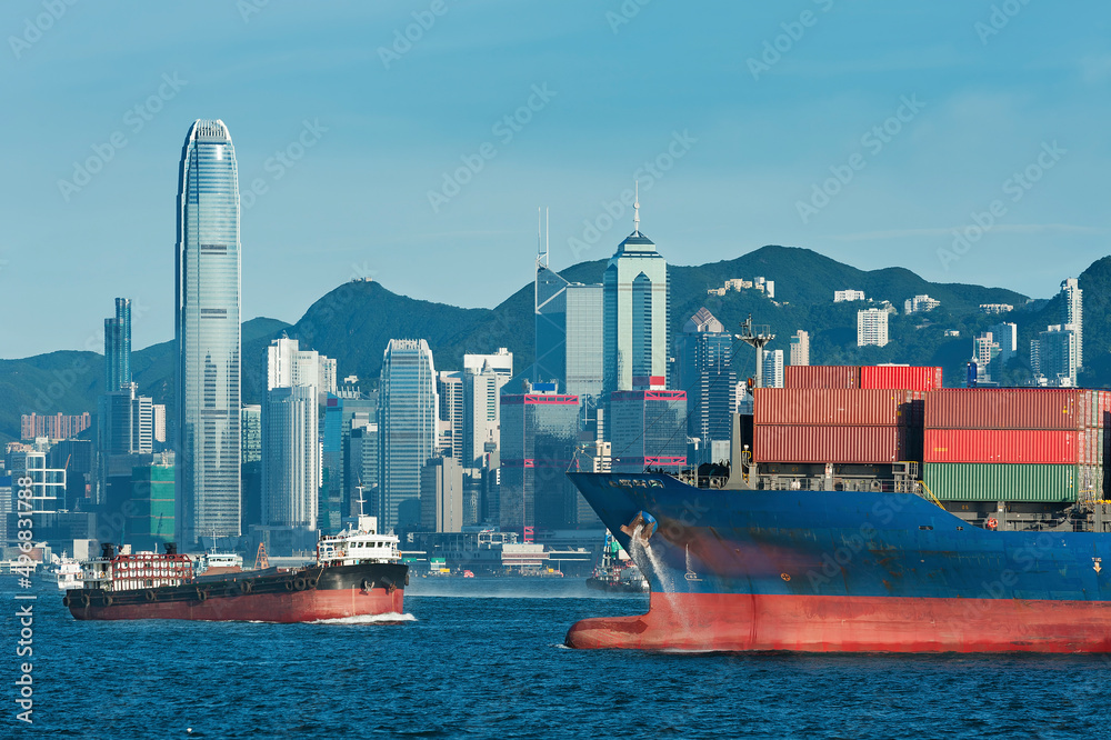 Cargo ship in Victoria Harbor of Hong Kong