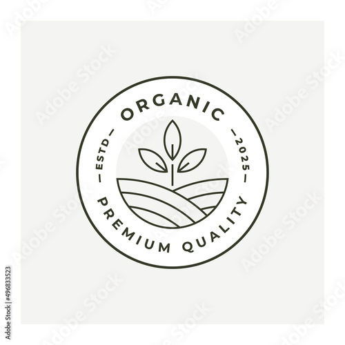 Organic logo stamp line icon design. Natural eco product emblem. Premium quality brand identity bio farm leaf symbol. Vector illustration.