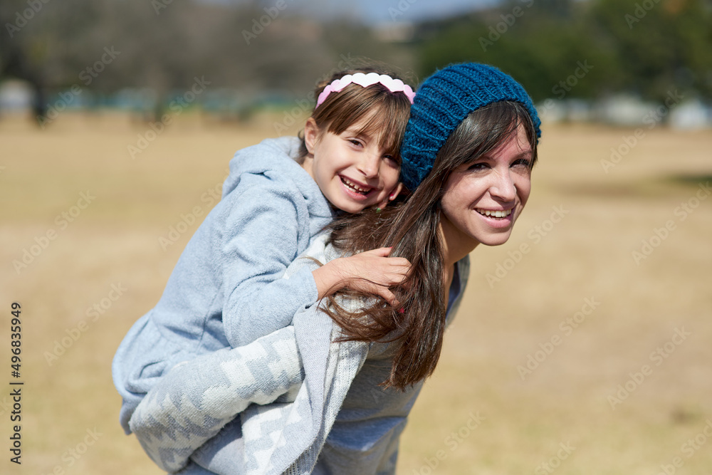 Being together is all that matters. Portrait of a mother and daughter bonding together at the park.