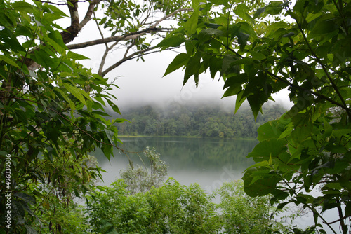 Shot of Ranamese lake with a forest background photo