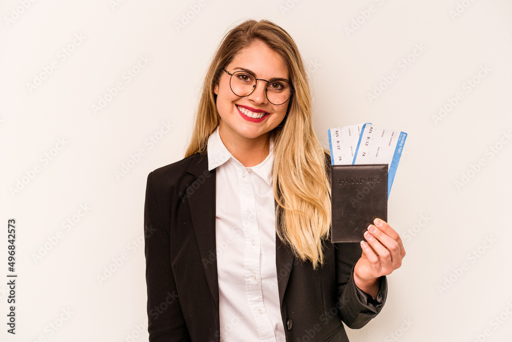 Young business caucasian woman holding a passport isolated on white background happy, smiling and cheerful. Young business caucasian woman holding a passport isolated on white background happy, smiling and cheerful.