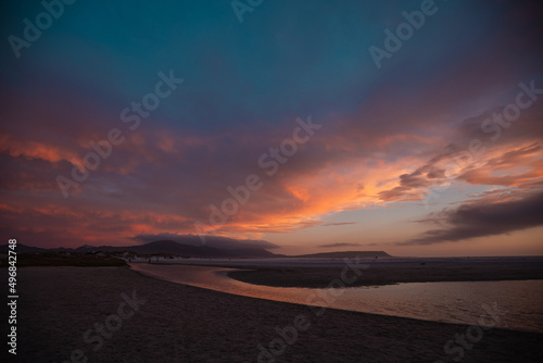 Beautiful sunset at a beach in Noordhoek, Cape Town, South Africa photo