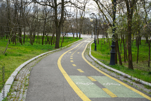 bicycle path in a public park. photo during the day.