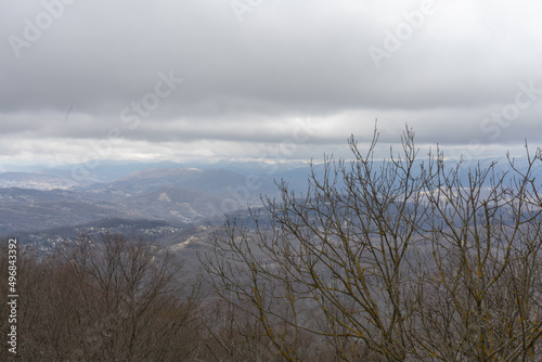 A mountain landscape with the sky and trees