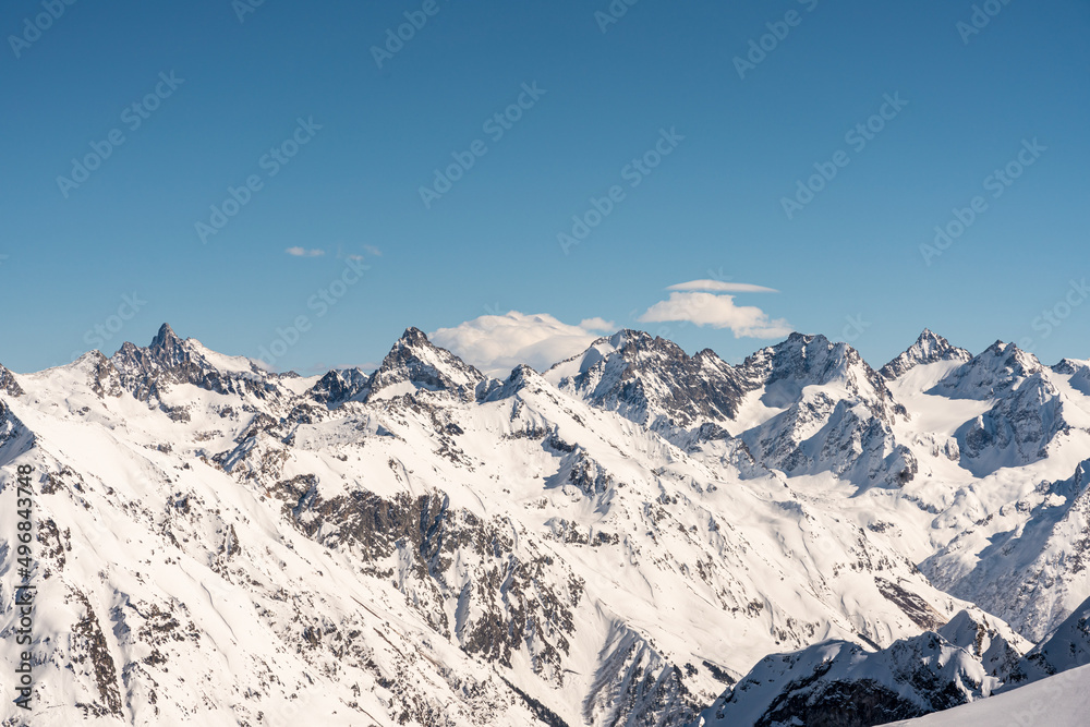 Panorama of winter snowy mountains in Caucasus region, Russia