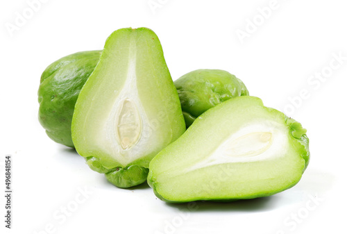 Closeup of fresh green chayote fruits isolated on a white background photo