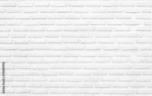 White grunge brick wall texture background for stone tile block painted in grey light 
