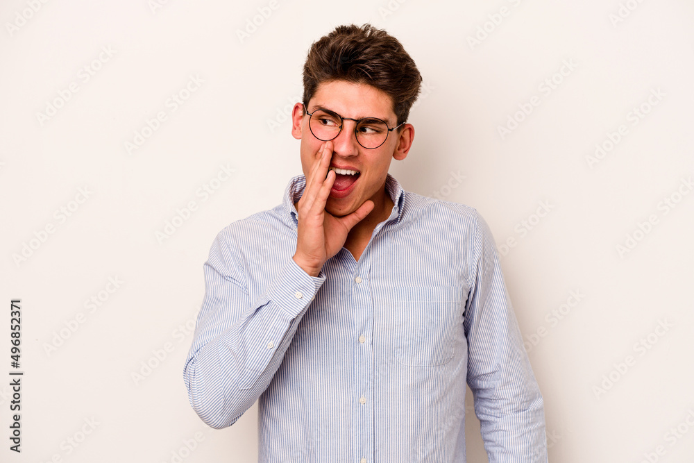 Young caucasian man isolated on white background shouting excited to front. Young caucasian man isolated on white background shouting excited to front.