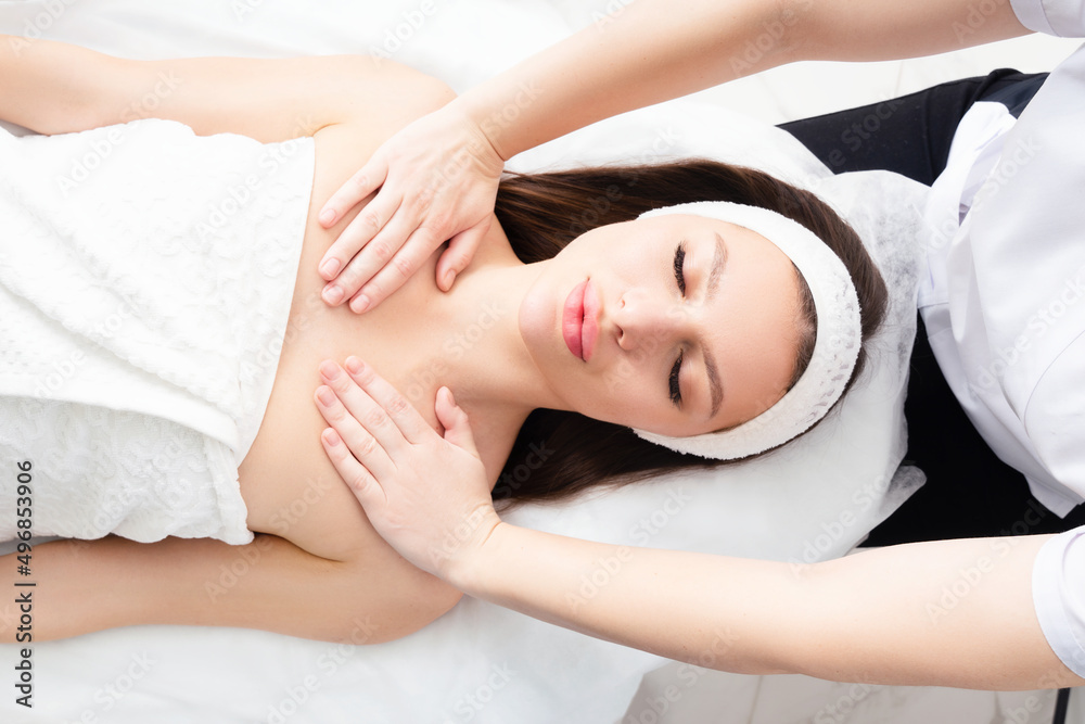 Cosmetic massage of the face and neck area. Cosmetic skin care to improve blood circulation. Firming skin and muscles, keeping skin smooth, youthful and supple for longer.